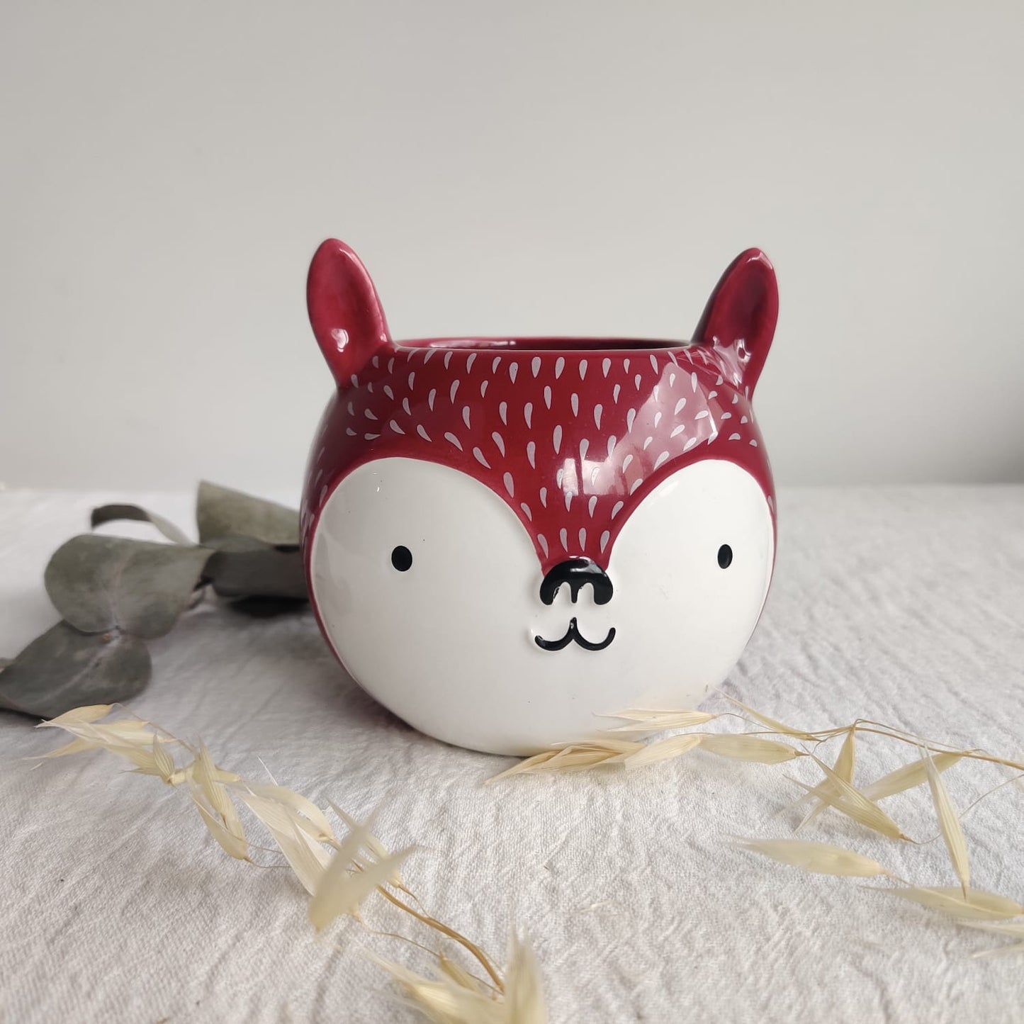 Maceta de zorrito rojo